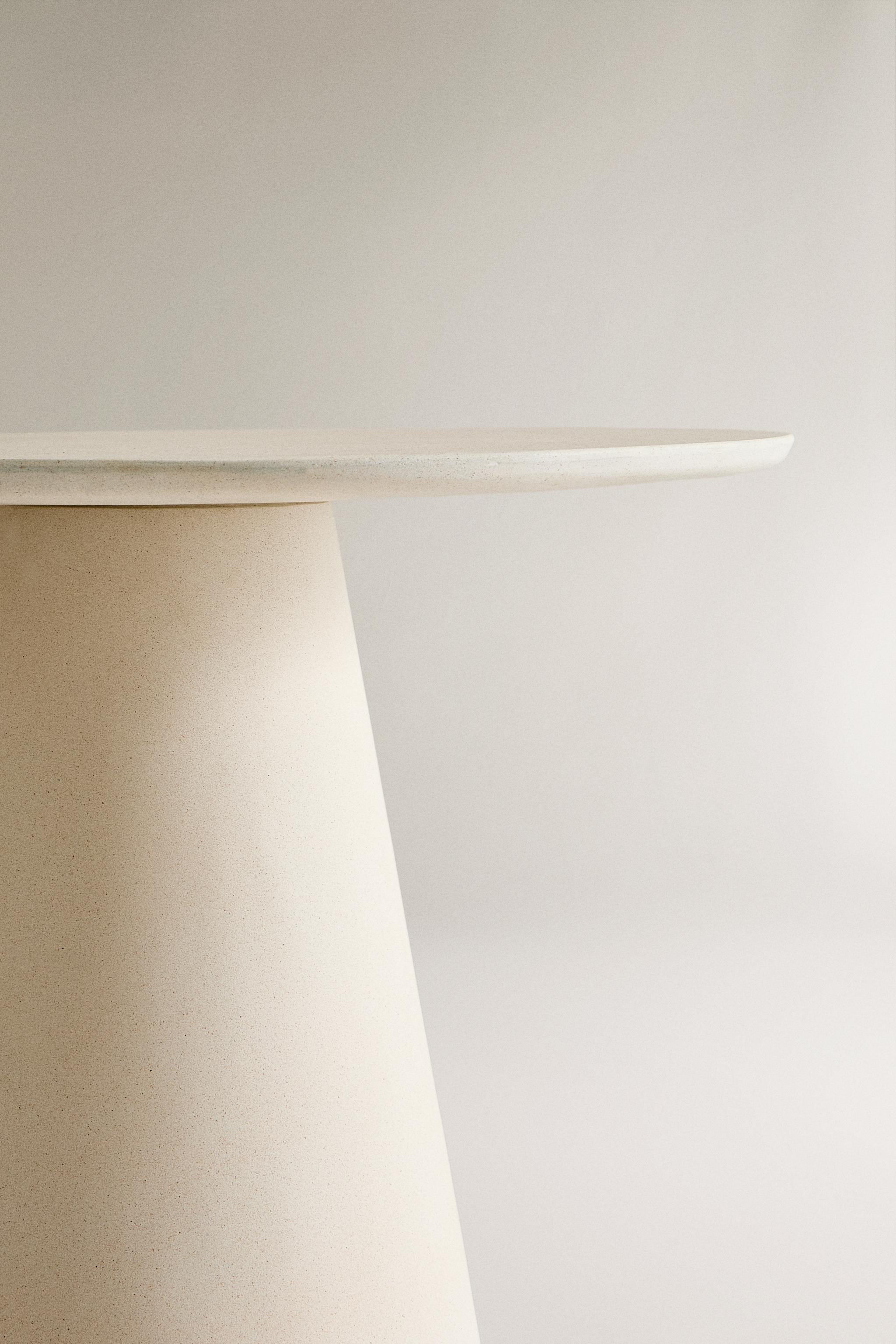TABLE WITH A CONICAL BASE